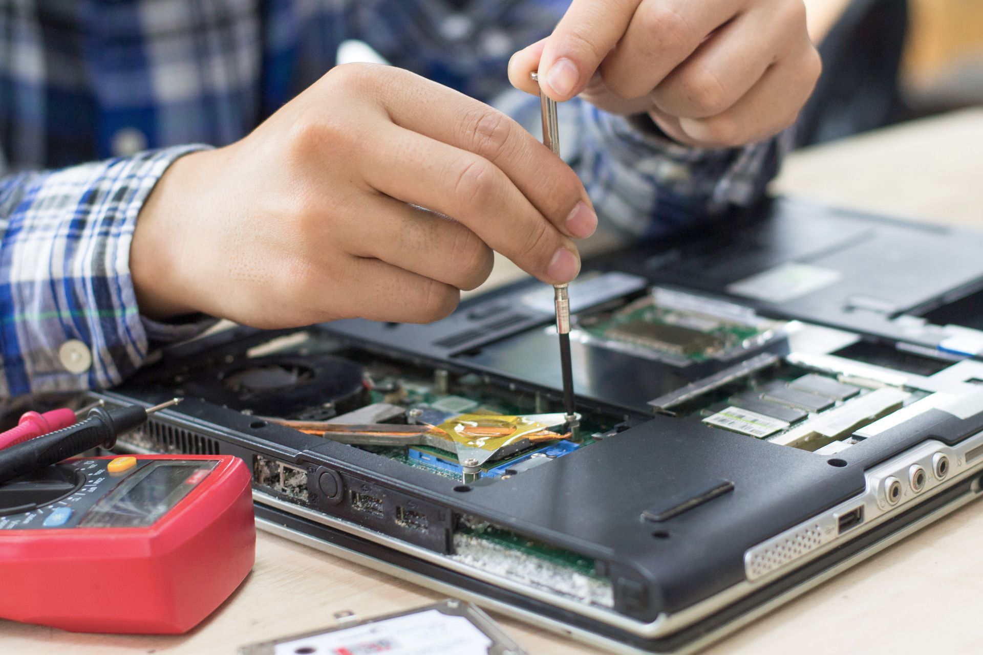 Man Using Screwdriver - Levin, NZ - BL MicroTek Ltd.