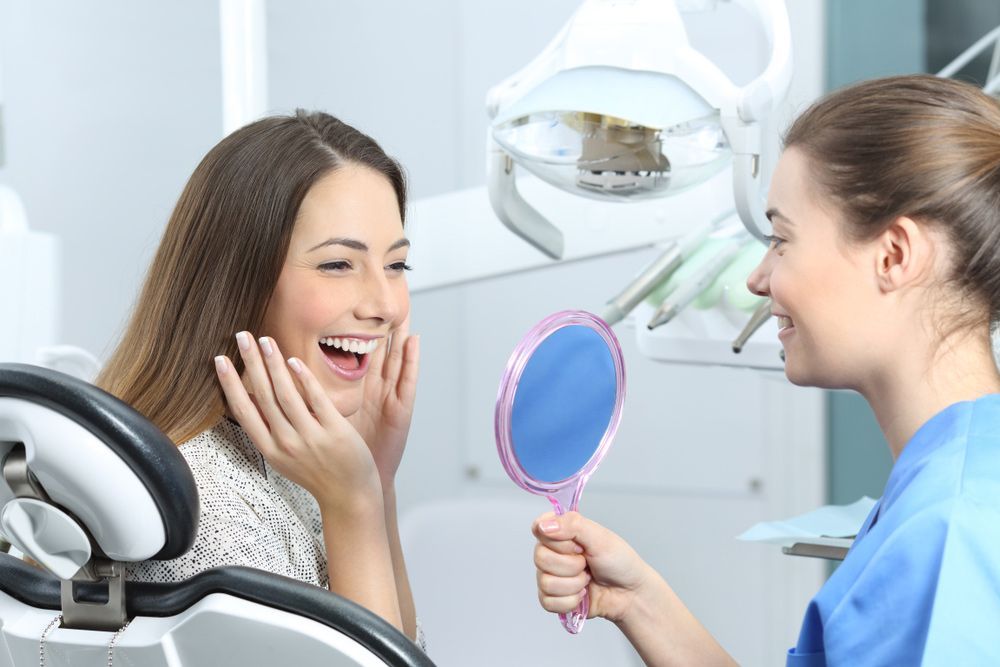 Woman Smiling After Dental Check-up — Dental Services in Berserker, QLD