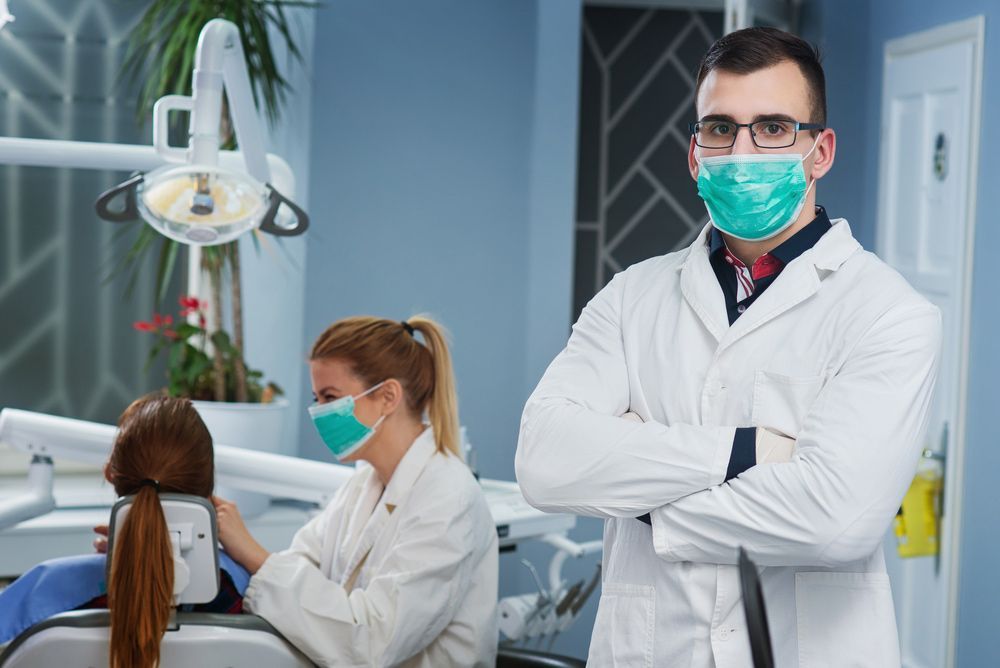 Dentist, Nurse, And Patient — Dental Services in Berserker, QLD
