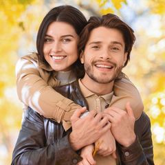 happy man and woman posing
