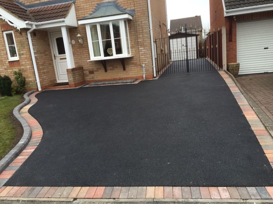 SJ Driveways & Patios tarmac driveway and patio specialists