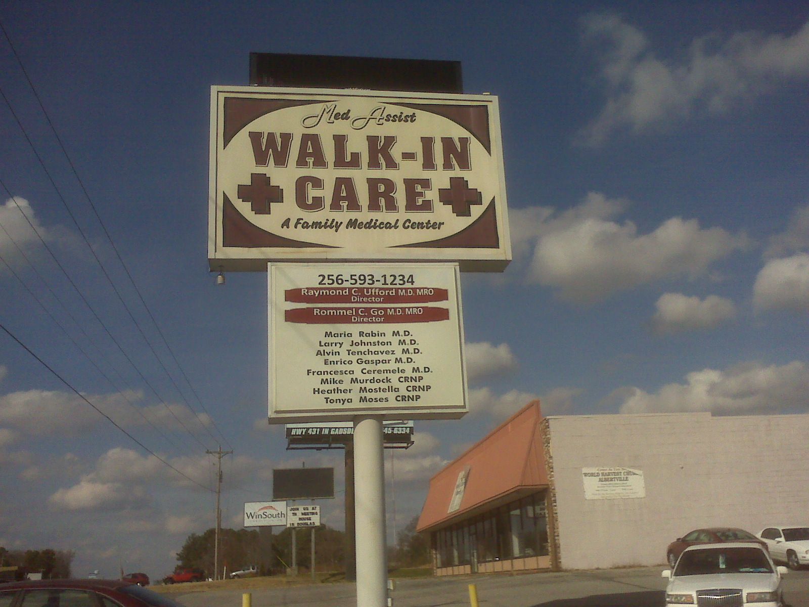 A sign that says walk-in care on it