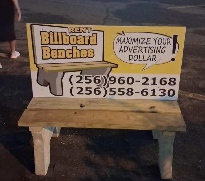 Bench sign advertising billboard rentals with phone numbers and “Maximize your advertising dollar.”
