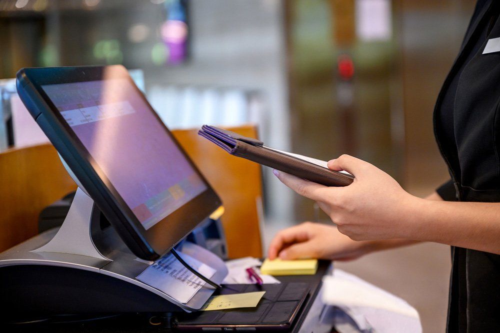 Woman Using Point of Sale System — Sydney, NSW — Hycom Equipment Pty Ltd Woman Using Point of Sale System — Sydney, NSW — Hycom Equipment Pty Ltd