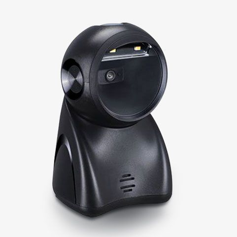 Black, stationary barcode scanner; dome-shaped head on a base, scanning light visible, on white.