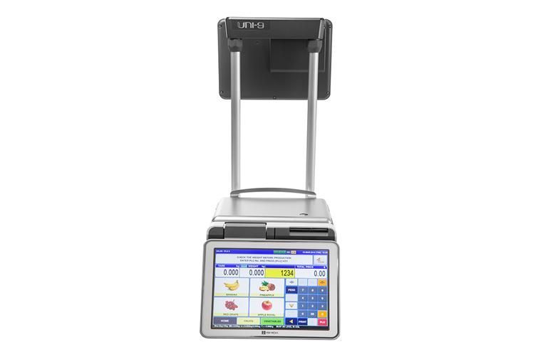 Digital food scale with touchscreen display, for weighing and pricing groceries.