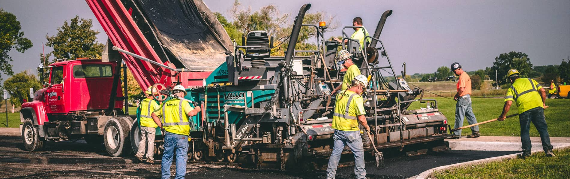 A Valley Construction crew paving a parking lot