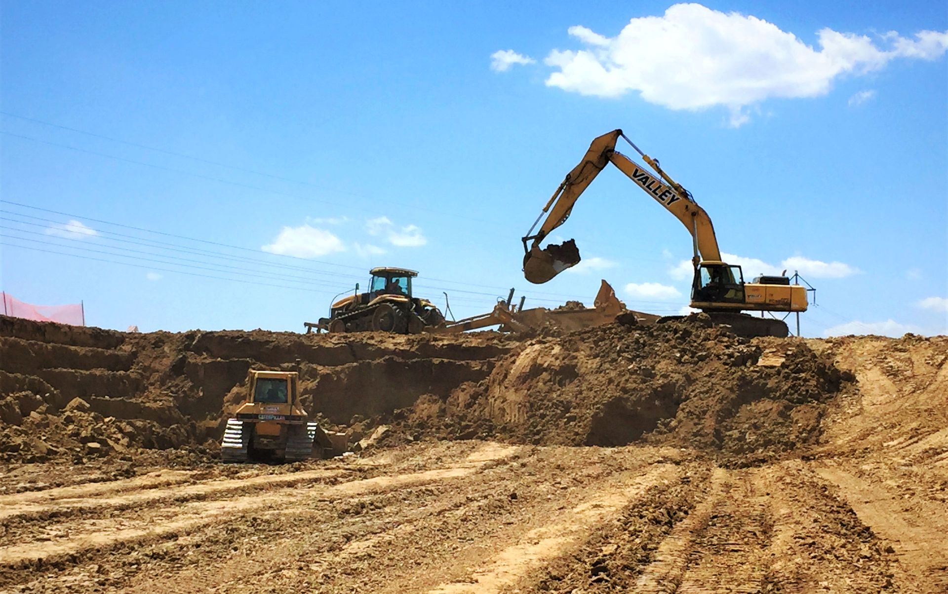 Construction equipment performing site development