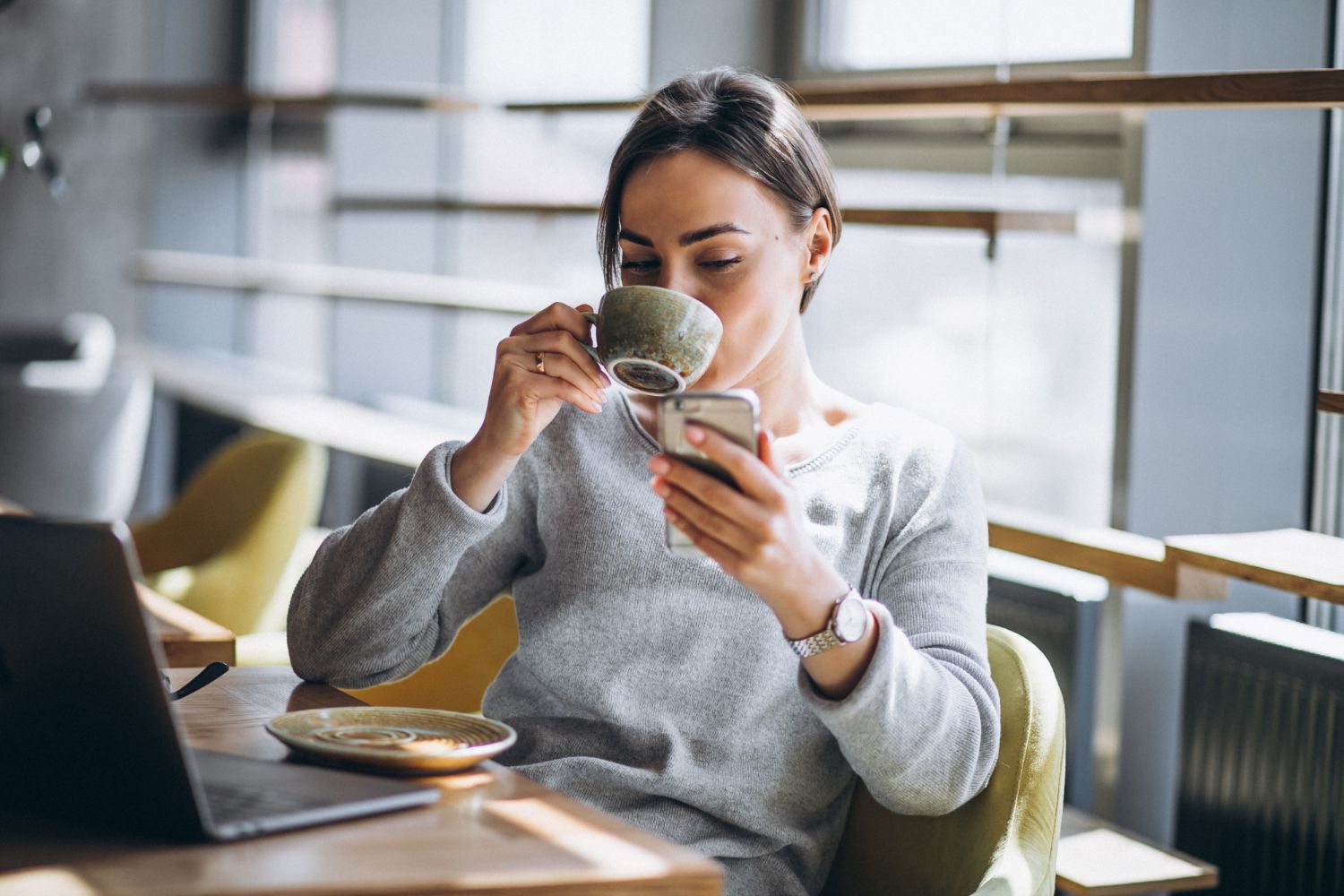woman drinking coffee
