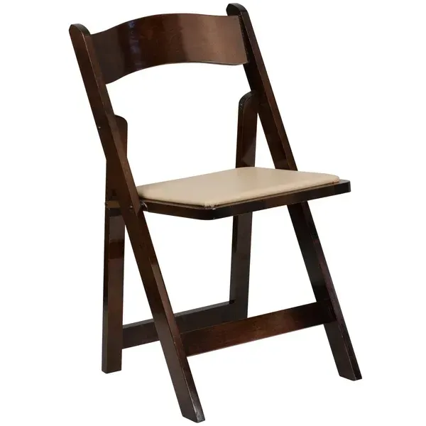 Dark wooden folding chair with a beige seat cushion on a white background