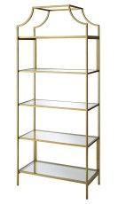 Gold metal open shelving unit with four shelves and decorative top frame