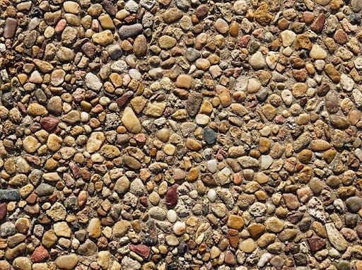 An overhead view of a white rectangular container with debris and shadows. An overhead view of a white rectangular container with debris and shadows.