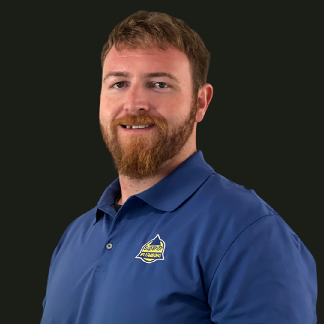 Service Plumber in Blue Collared Shirt