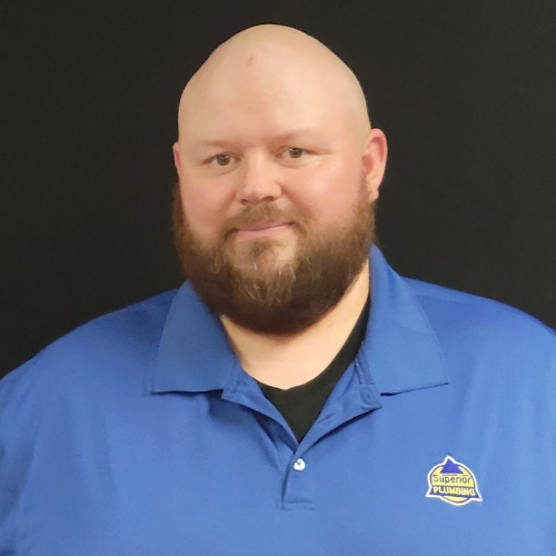 Service Plumber in Blue Collared Shirt