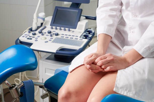 Woman at Dr. Arthur J. Grizzle, M.D.'s office in Key West, FL, waiting for gynecologic surgery consultation and test results.