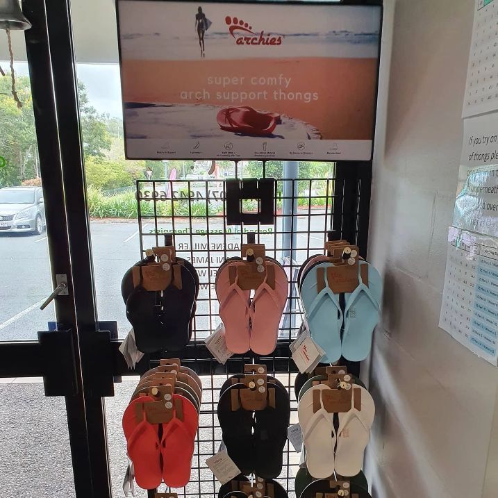 A Display of Flip Flops in a Store — Anderson Family Chiropractic Health Centre in Mount Pleasant, QLD