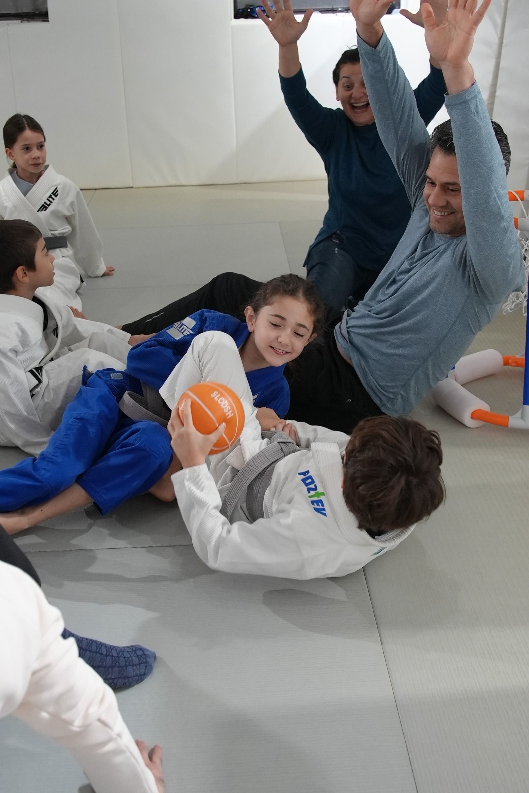 Kids practicing safe partner drills at Killer B Combat Academy in Oakhurst, NJ, building confidence and focus.