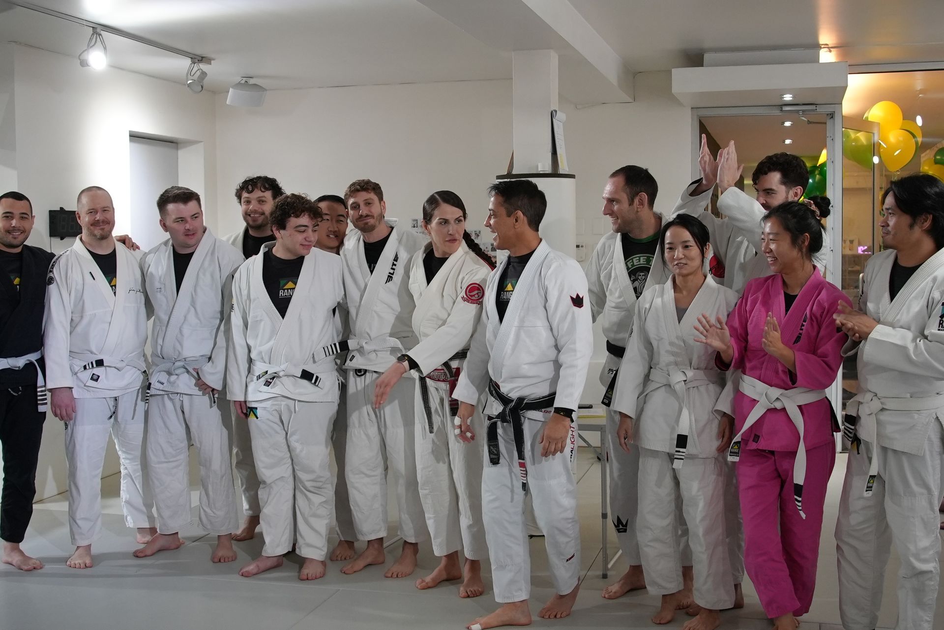 Adults drilling Brazilian Jiu-Jitsu technique at Range Brazilian Jiu-Jitsu NYC in New York, building fitness and focus.