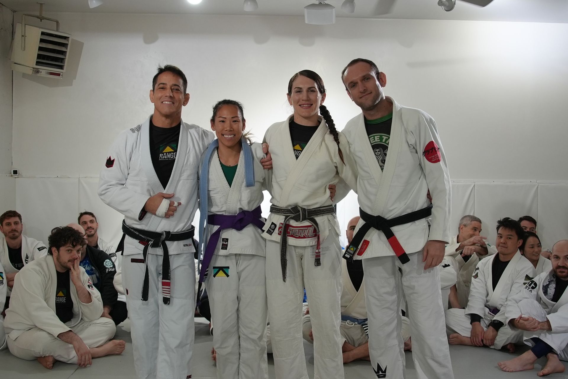 Adults training Brazilian Jiu-Jitsu at Range Brazilian Jiu-Jitsu NYC in New York, NY for fitness and confidence