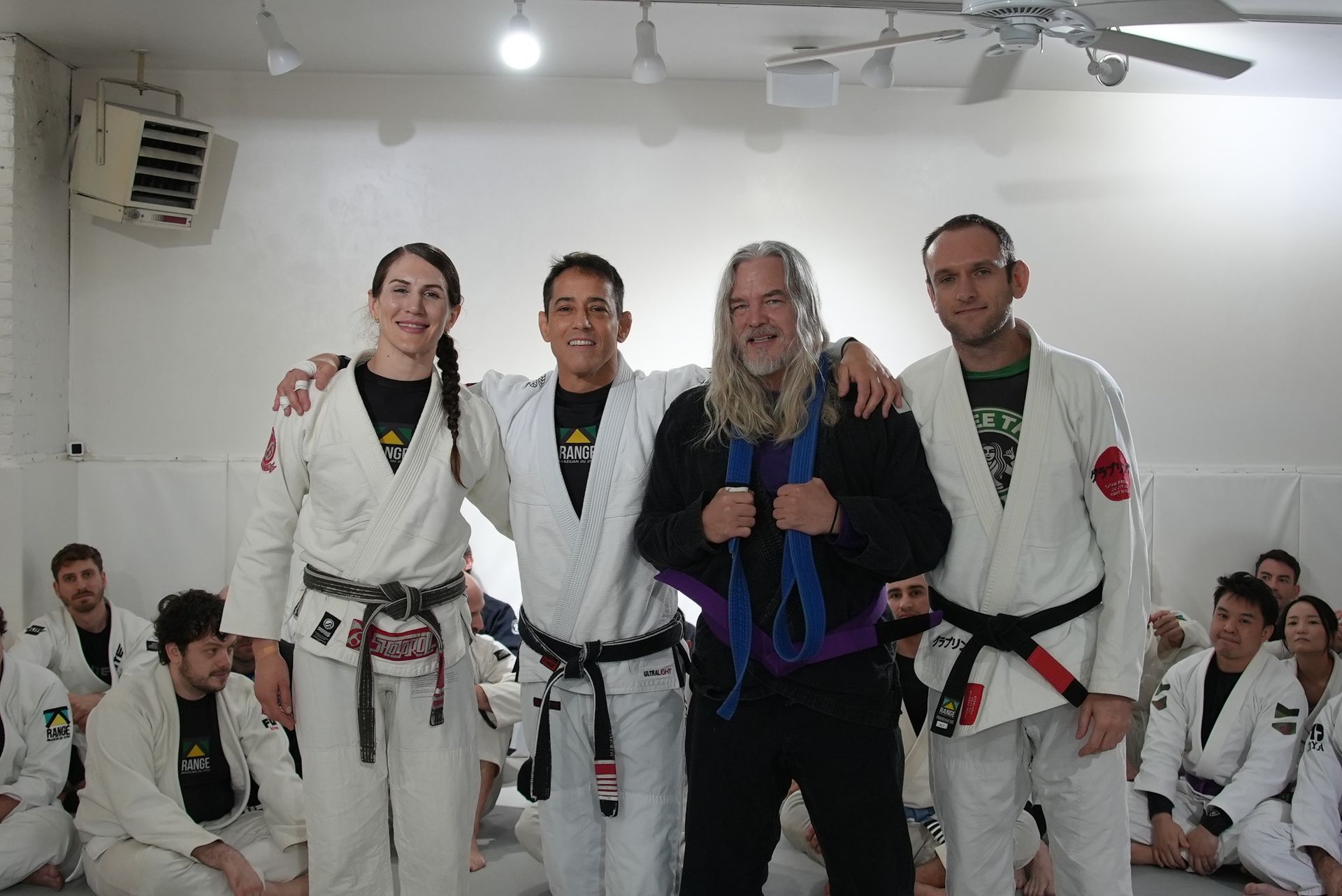 Students drilling Brazilian Jiu-Jitsu technique at Range Brazilian Jiu-Jitsu NYC in New York, NY for fitness and stress relief
