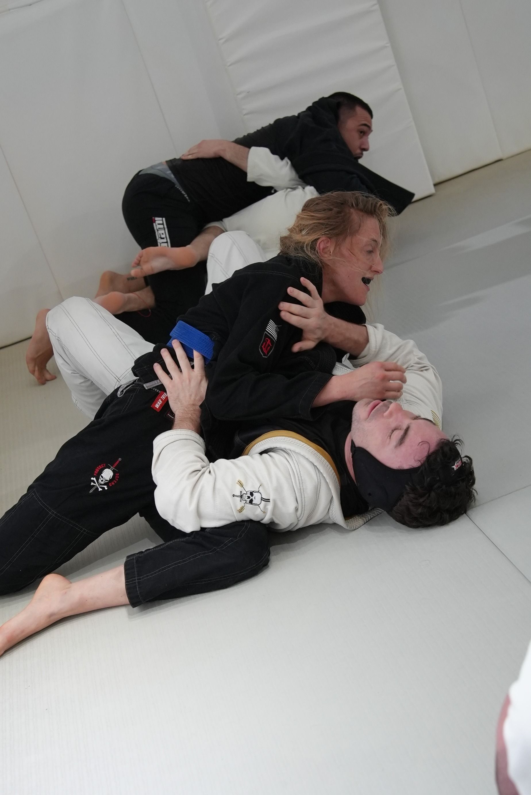 Beginners drilling Brazilian Jiu-Jitsu techniques at Range Brazilian Jiu-Jitsu NYC in New York, NY for fitness and self-defense.