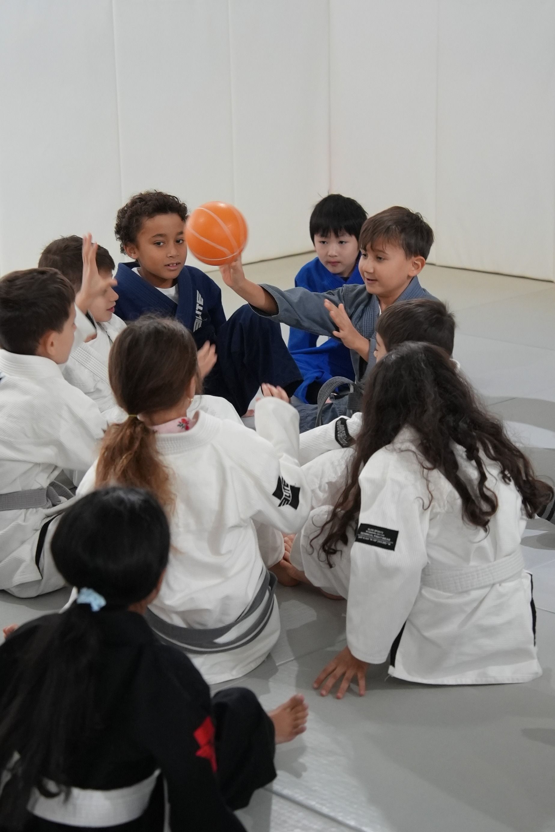 Students drilling Brazilian Jiu-Jitsu at Range Brazilian Jiu-Jitsu NYC in New York, building focus and calm energy.