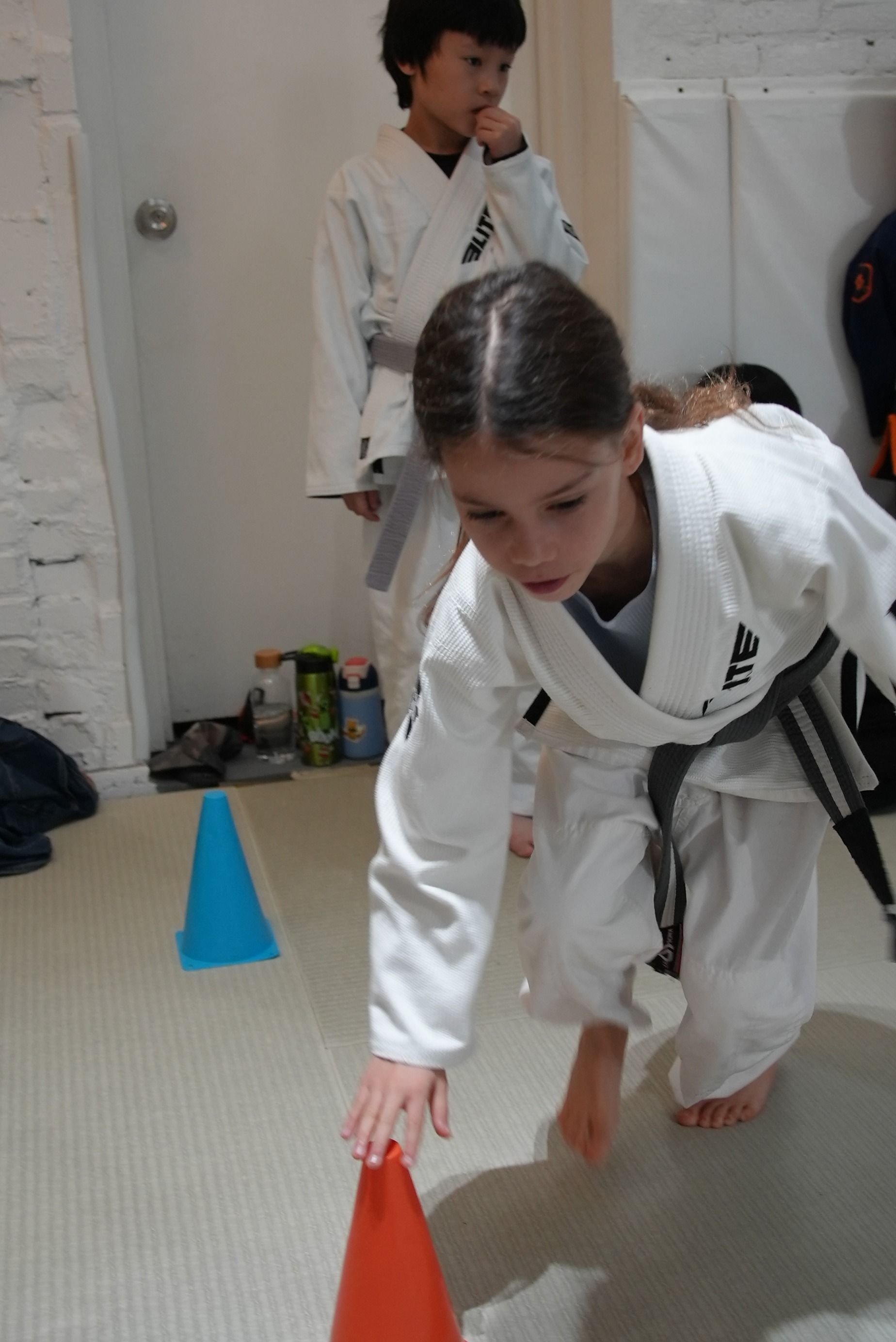 Kids training Youth Brazilian Jiu-Jitsu at Range Brazilian Jiu-Jitsu NYC in New York, NY, building confidence