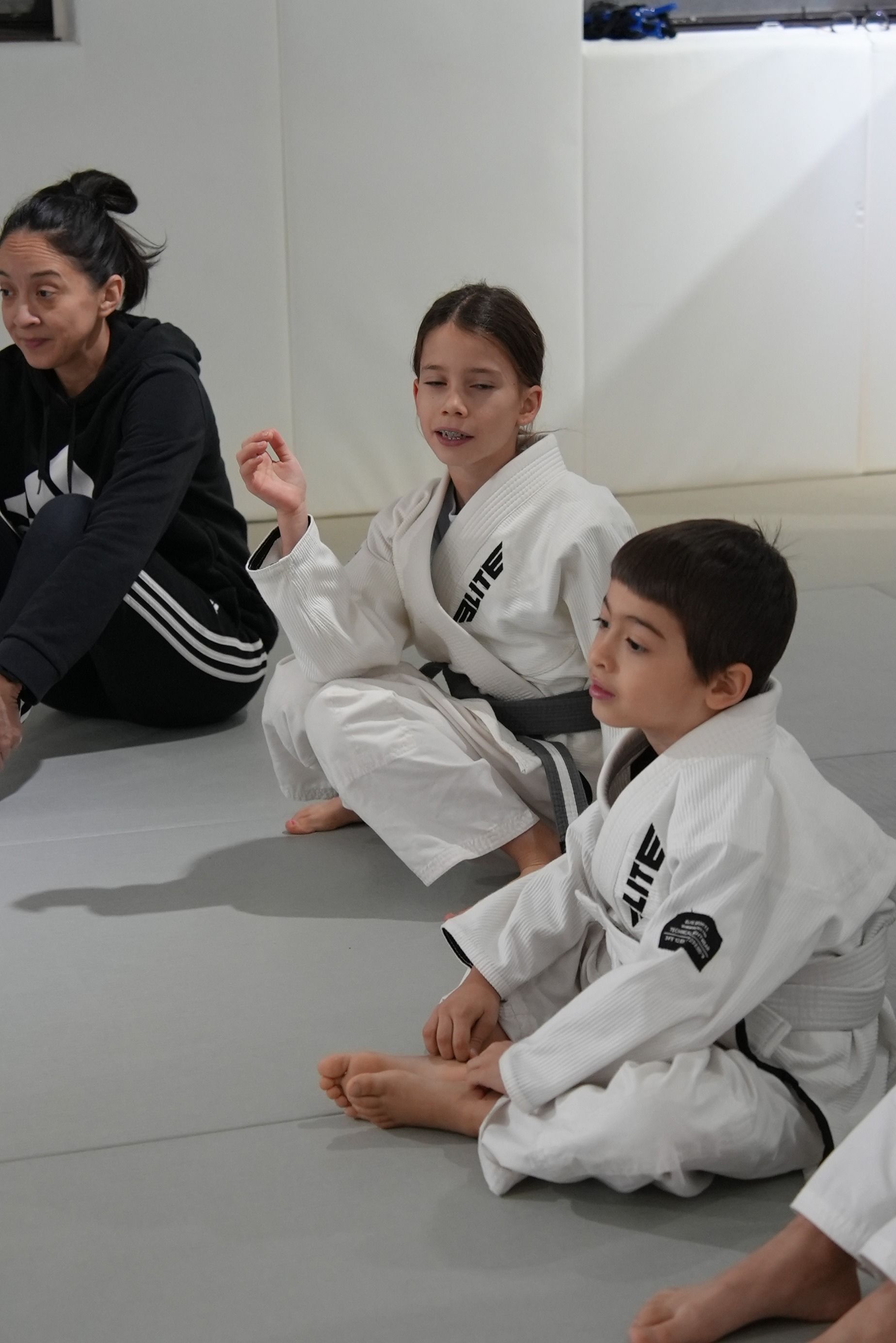Kids practice Youth Brazilian Jiu-Jitsu drills at Range Brazilian Jiu-Jitsu NYC in New York, building calm confidence.