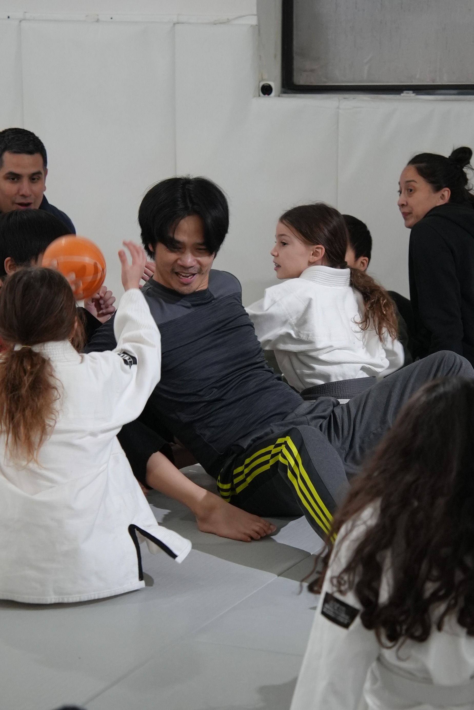 Kids practicing controlled grappling drills at Range Brazilian Jiu-Jitsu NYC in New York, building focus and confidence.