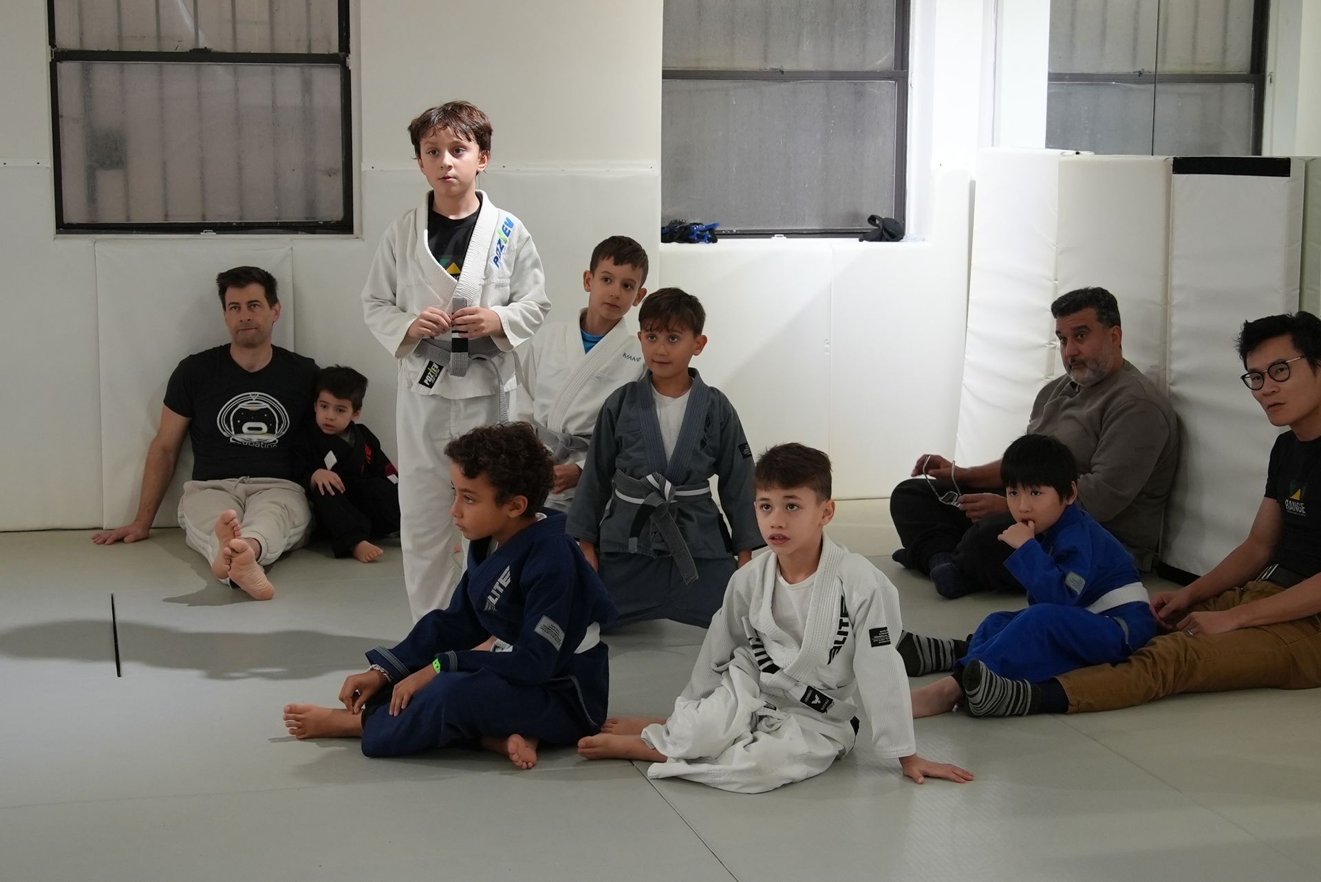 Kids practicing controlled grappling drills at Range Brazilian Jiu-Jitsu NYC in New York, building confidence and focus.