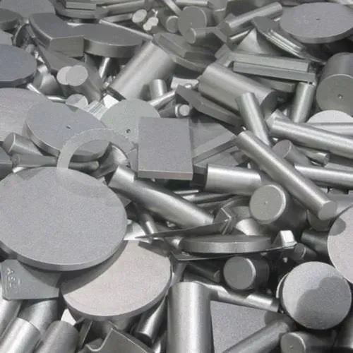 Pile of assorted silver metal shapes and rods stacked together