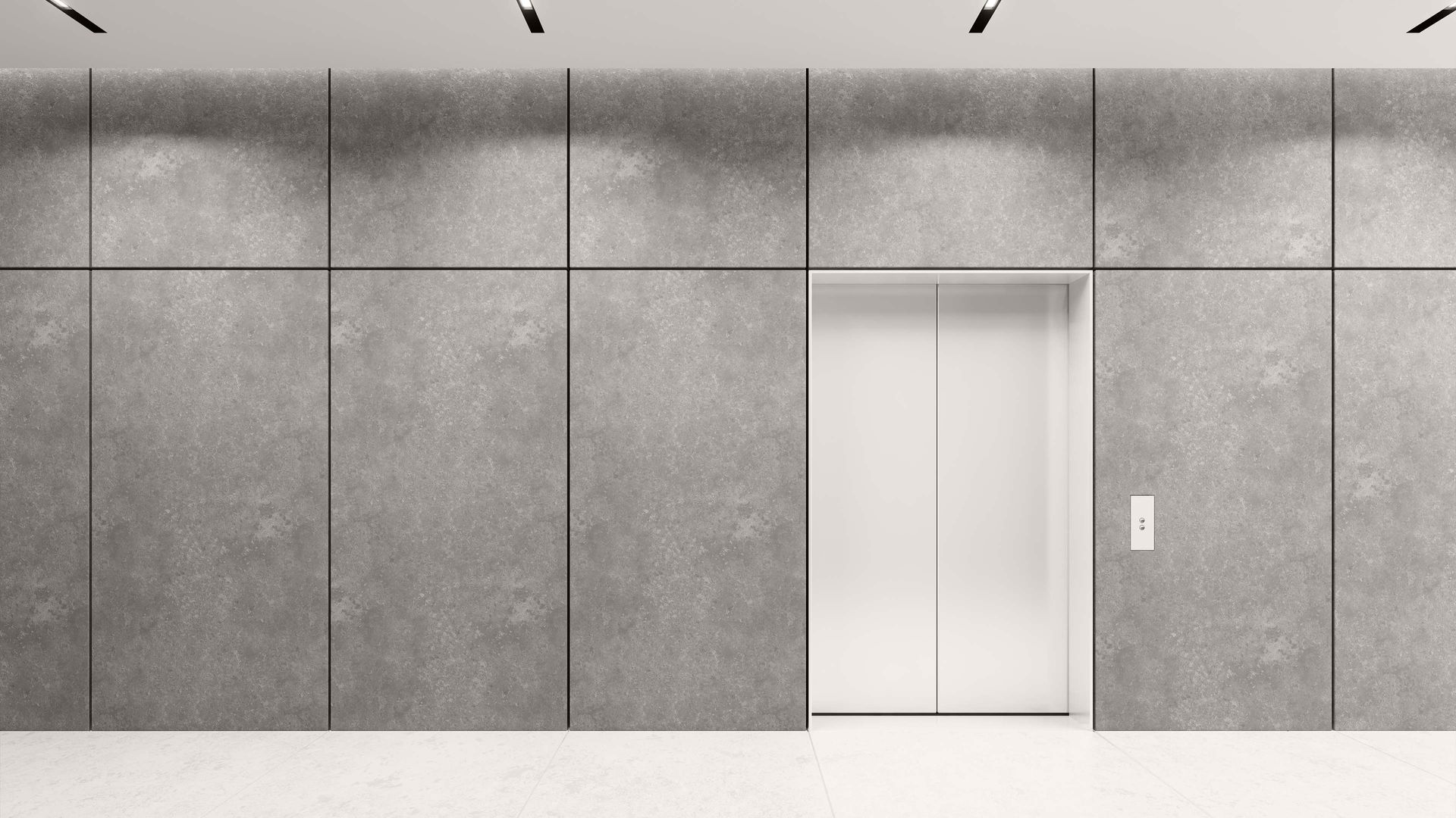 Modern gray wall with a centered white door and small light switch in a minimalist interior
