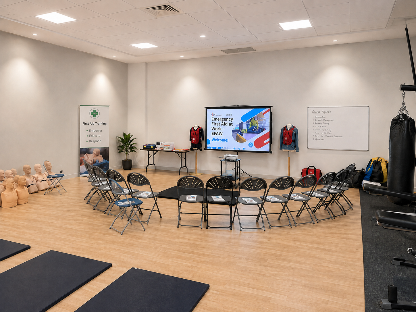Large classroom prepared for Emergency First Aid at Work training