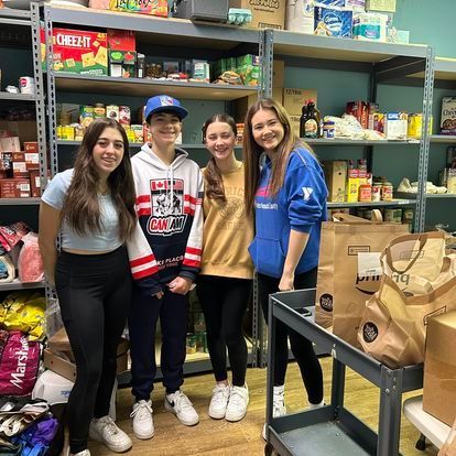 volunteers in pantry