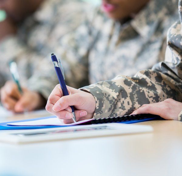 Veterans Filling Up a Form — New Port Richey, FL — CareerSource Pasco Hernando