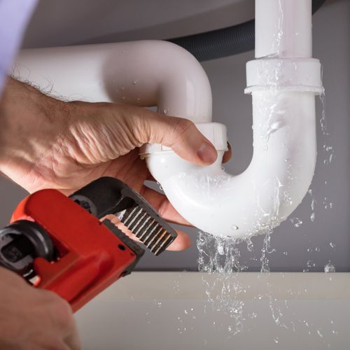 Plumber Fixing Broken Pipe Plumber Fixing Broken Pipe