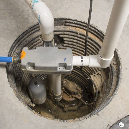 A Newly Installed Sump Pump A Newly Installed Sump Pump