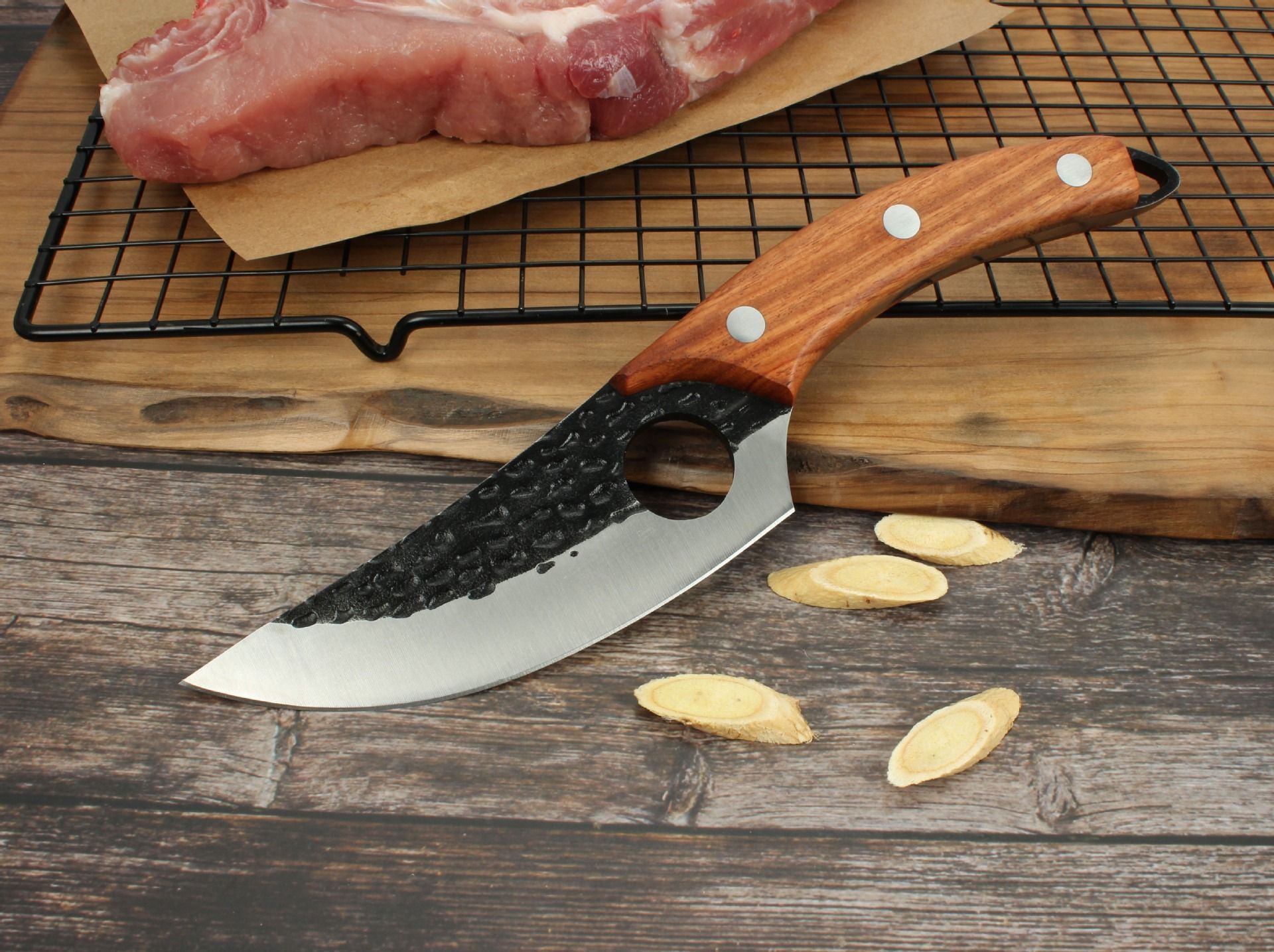 A brown leather knife sheath with two brass snap buttons, shown against a plain white background.