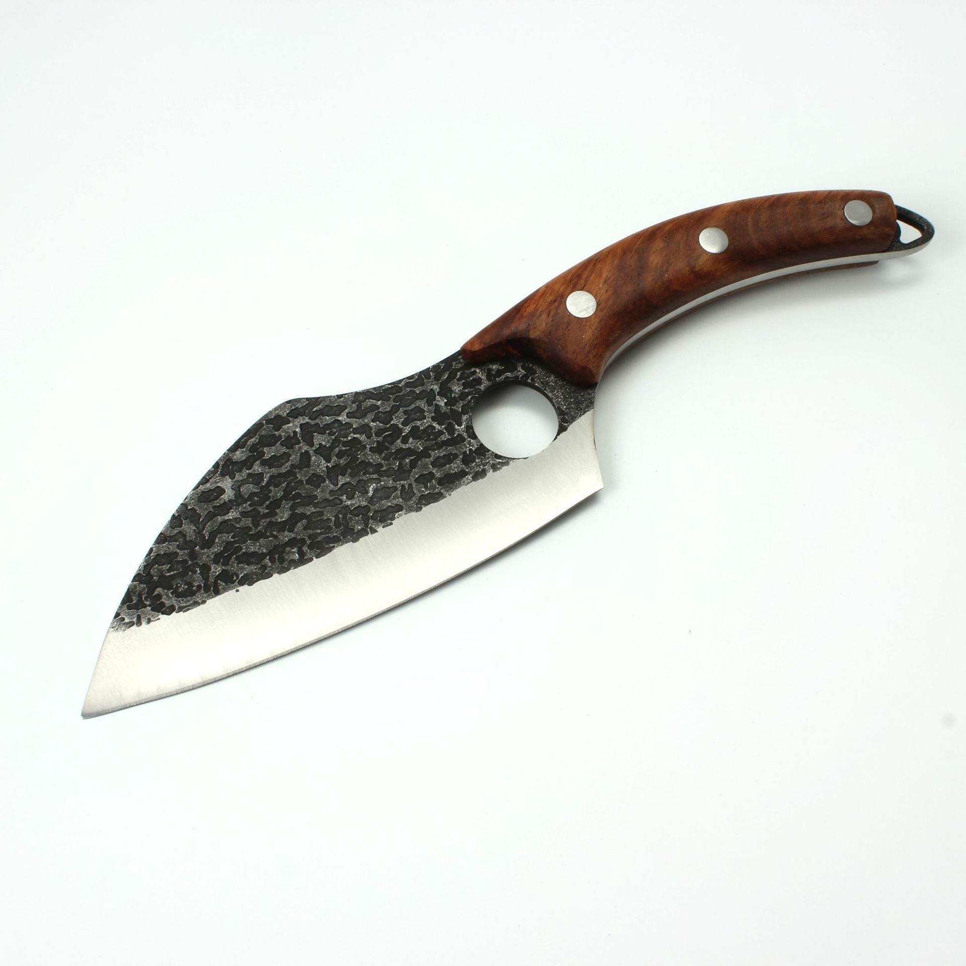 A fixed-blade hunting knife with a hammered finish, curved wood handle, and finger hole, against a white background.