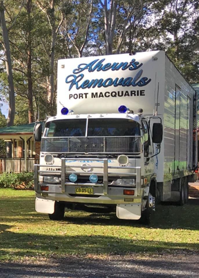 A Moving Truck Is Filled With Furniture And Boxes — Ahern's Removals In Port Macquarie, NSW
