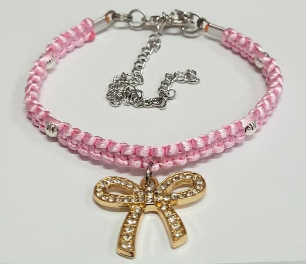 Pink Macrame Bracelet/Anklet featuring a Gold Bow, fits from 6.5 to 10 inches, durable 316 stainless steel accents.