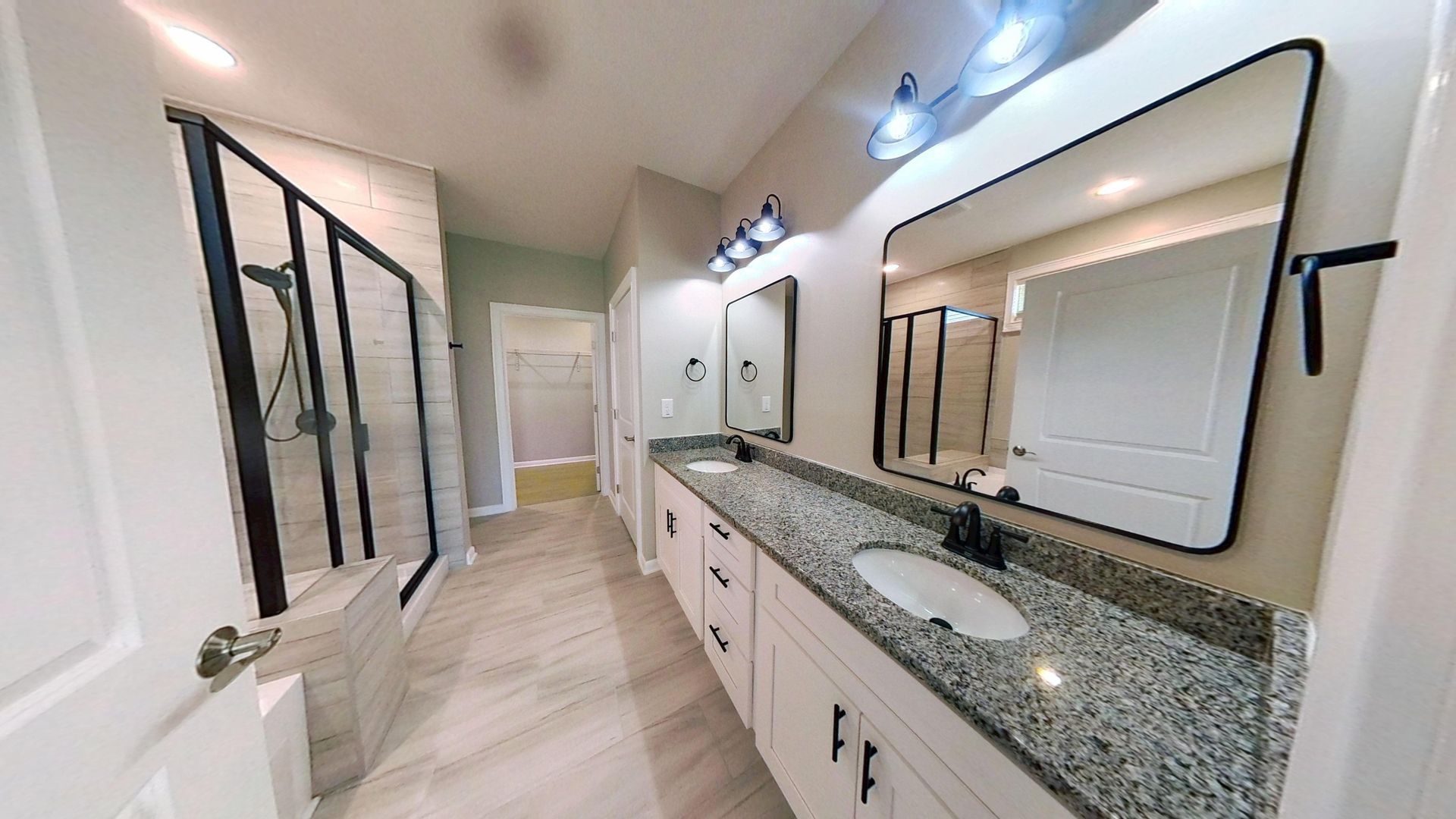 Bathroom after complete fire damage restoration with new fixtures