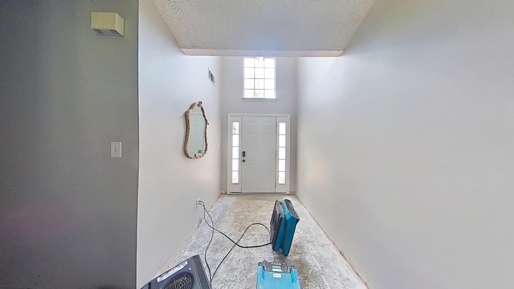 Entryway before flood damage restoration in Buford