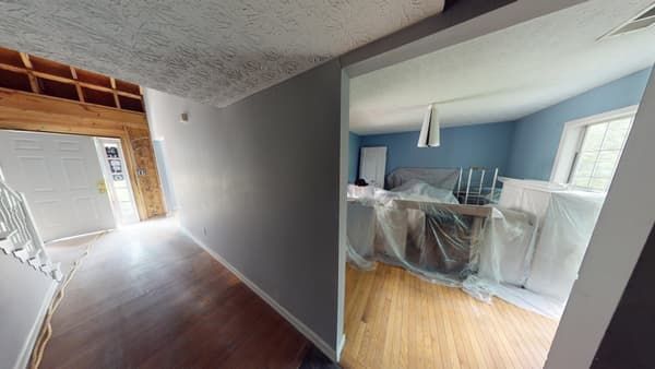 Hallway and living room before fire damage restoration