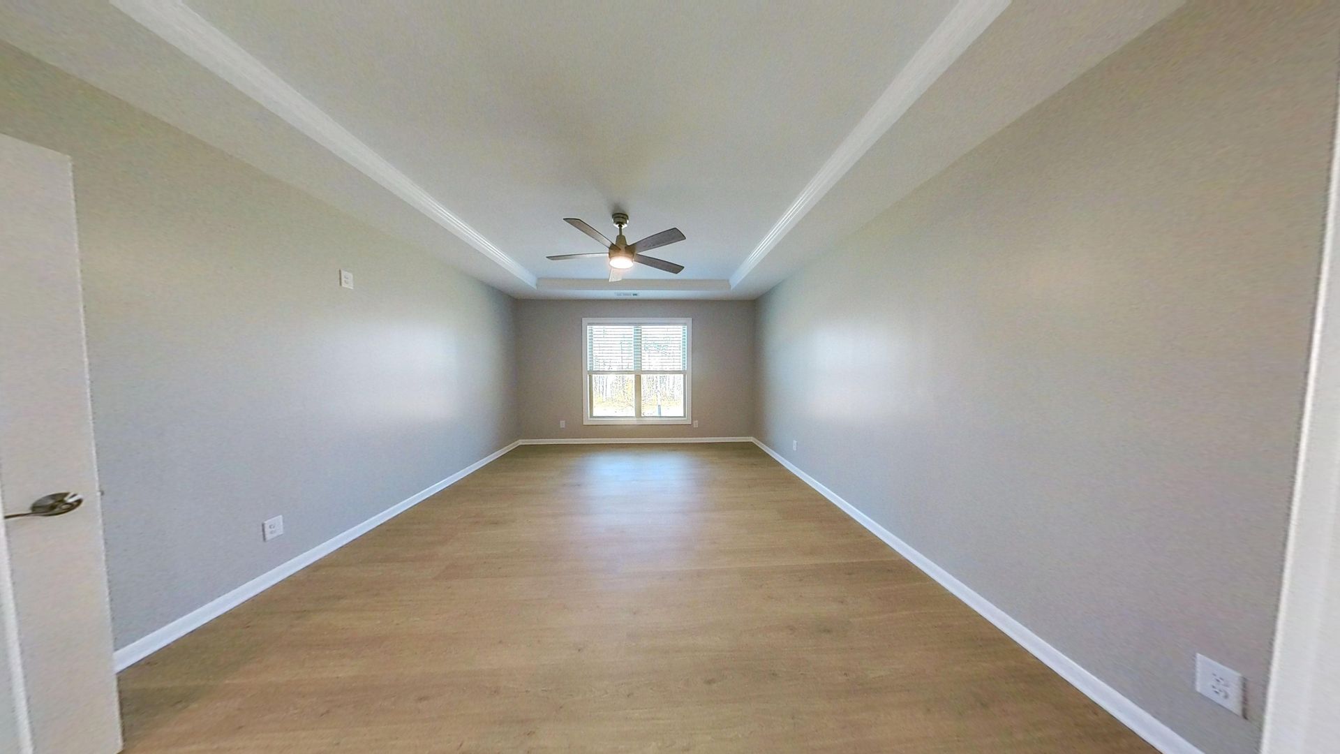 Bedroom after complete fire damage restoration with new drywall and paint