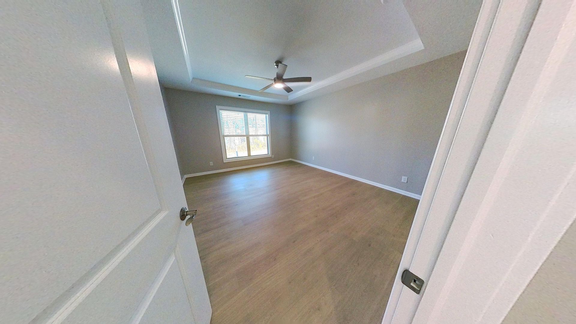 Second bedroom after fire damage restoration fully rebuilt