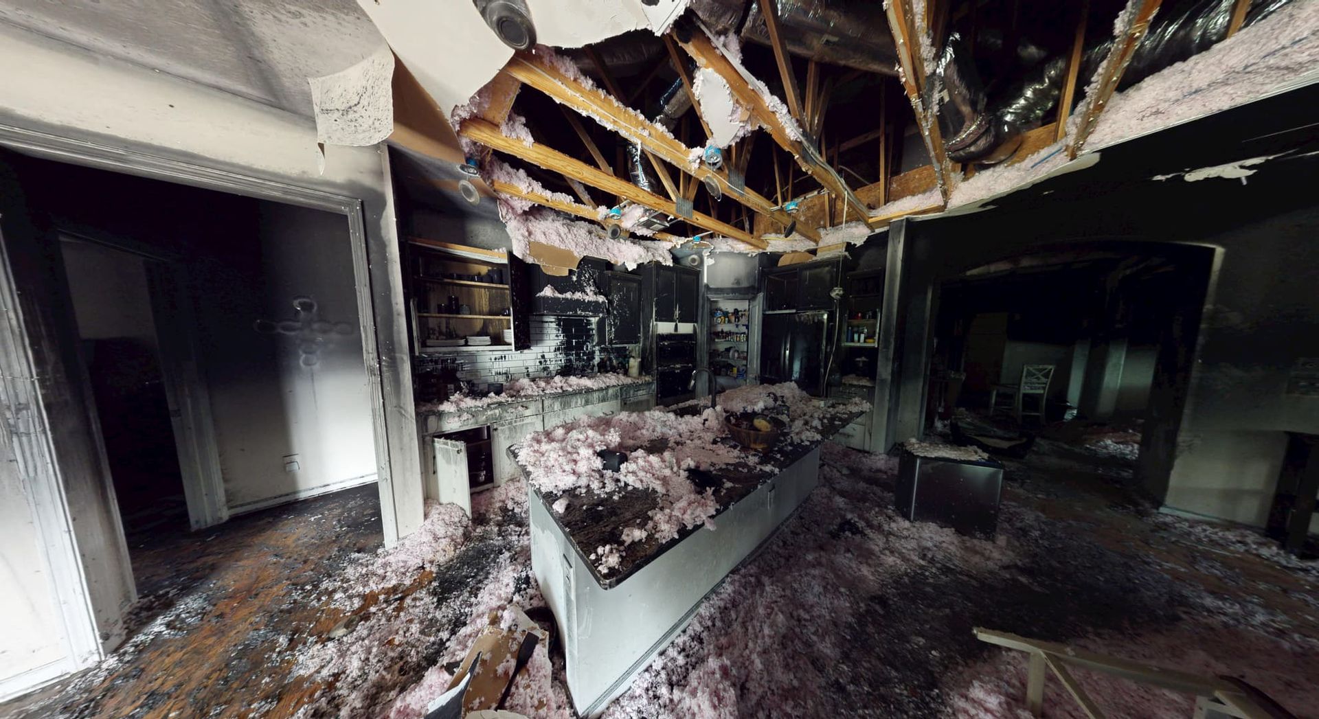 Second angle of fire damaged kitchen before restoration