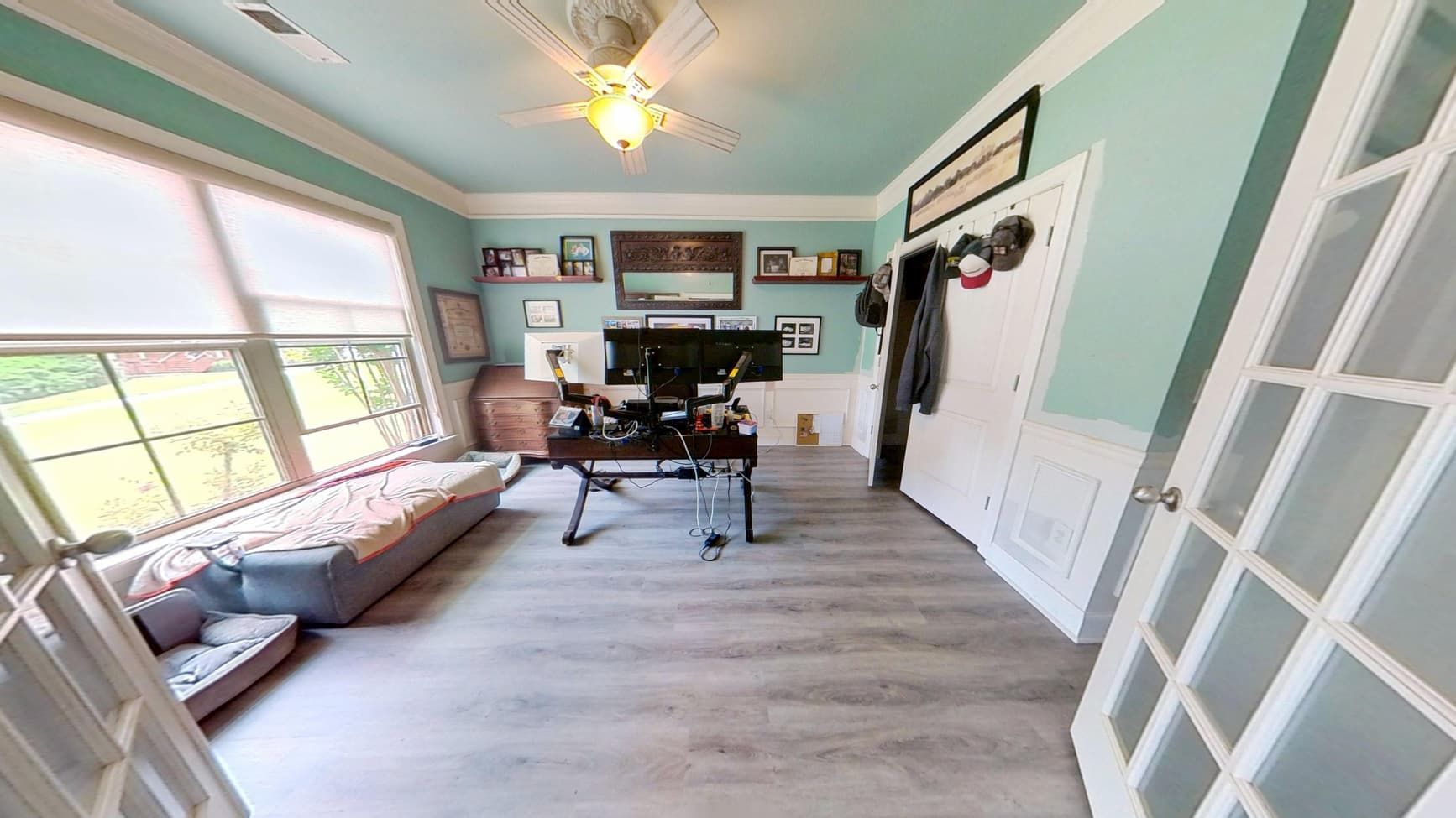 Restored home office with new dry flooring after flood cleanup by The Homestar Group