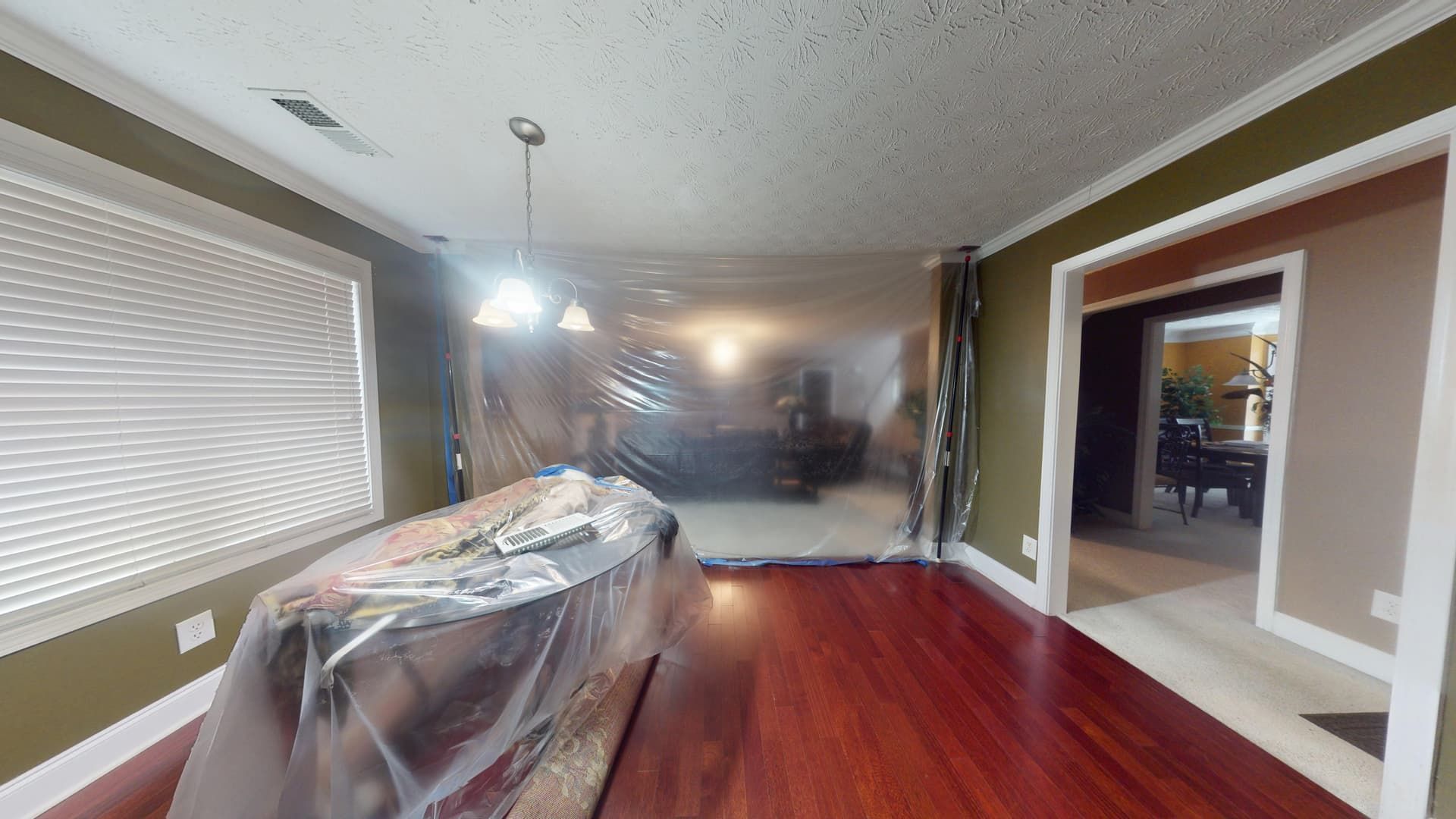 Dining room water damage in Stonecrest residence before professional cleanup