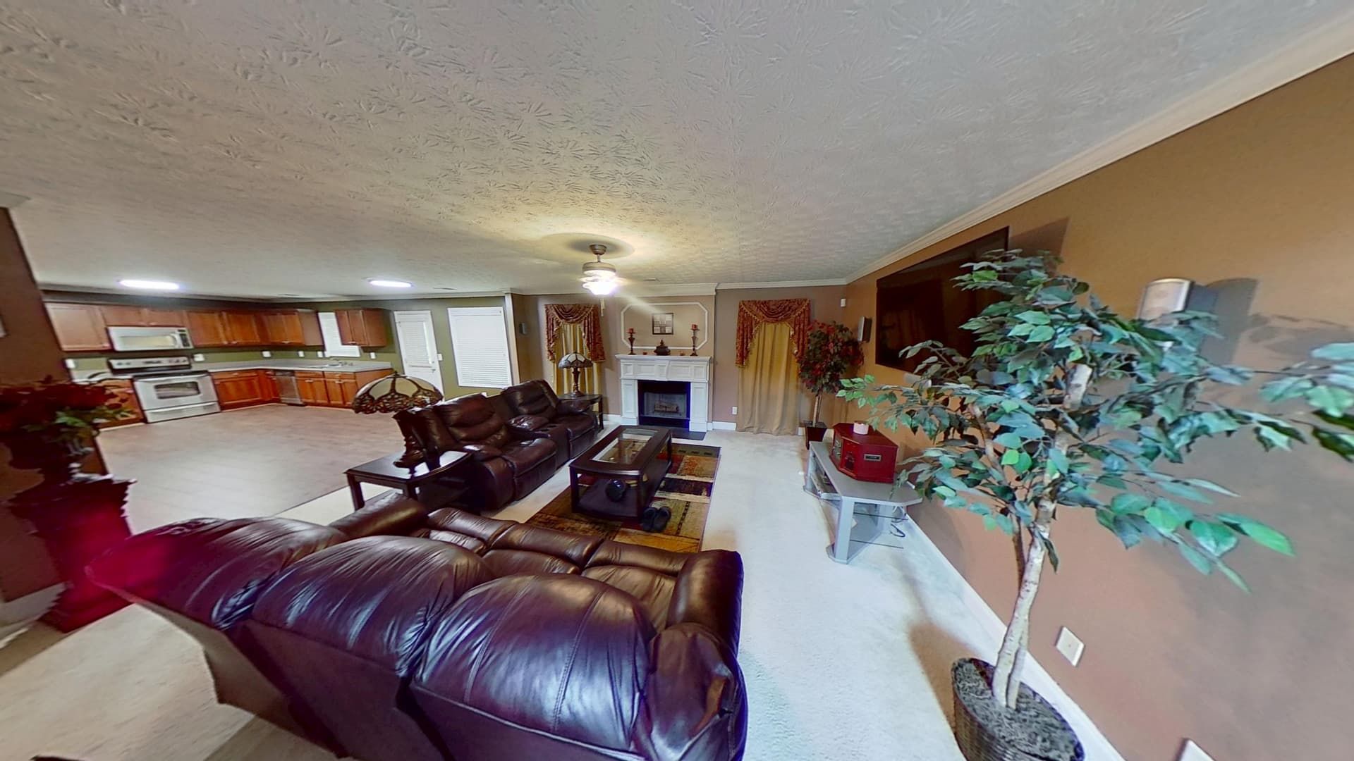 Stonecrest living room fully restored after flood cleanup with fresh finishes